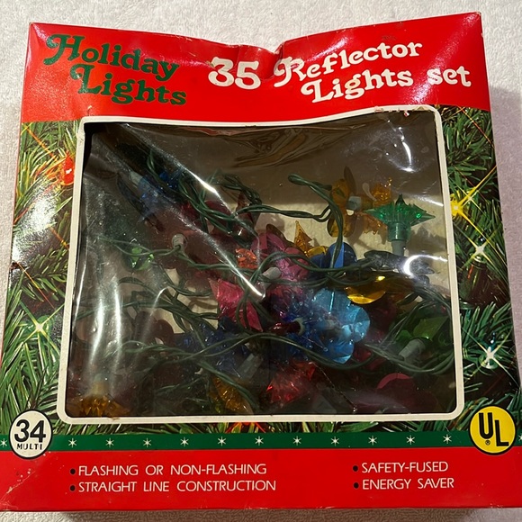 Flower shaped multi colored lights with reflectors in original box. - Picture 2 of 3